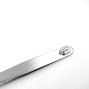 PINZAS DE DEPILAR CON CRÁNEO DE METAL
